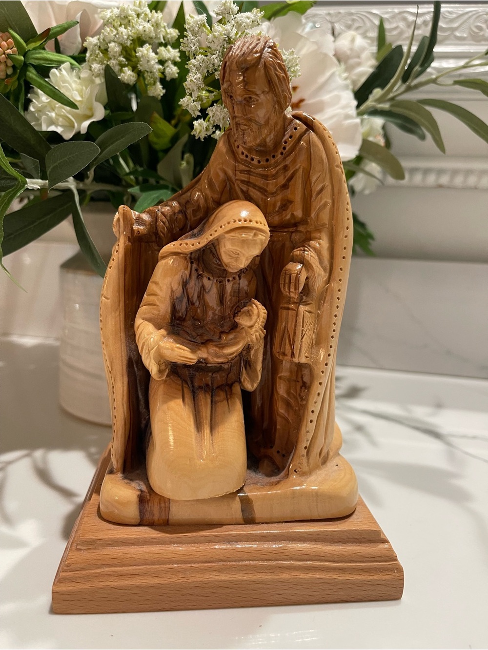 hand-carved olive wood Holy Family sculpture by Nissan Bros